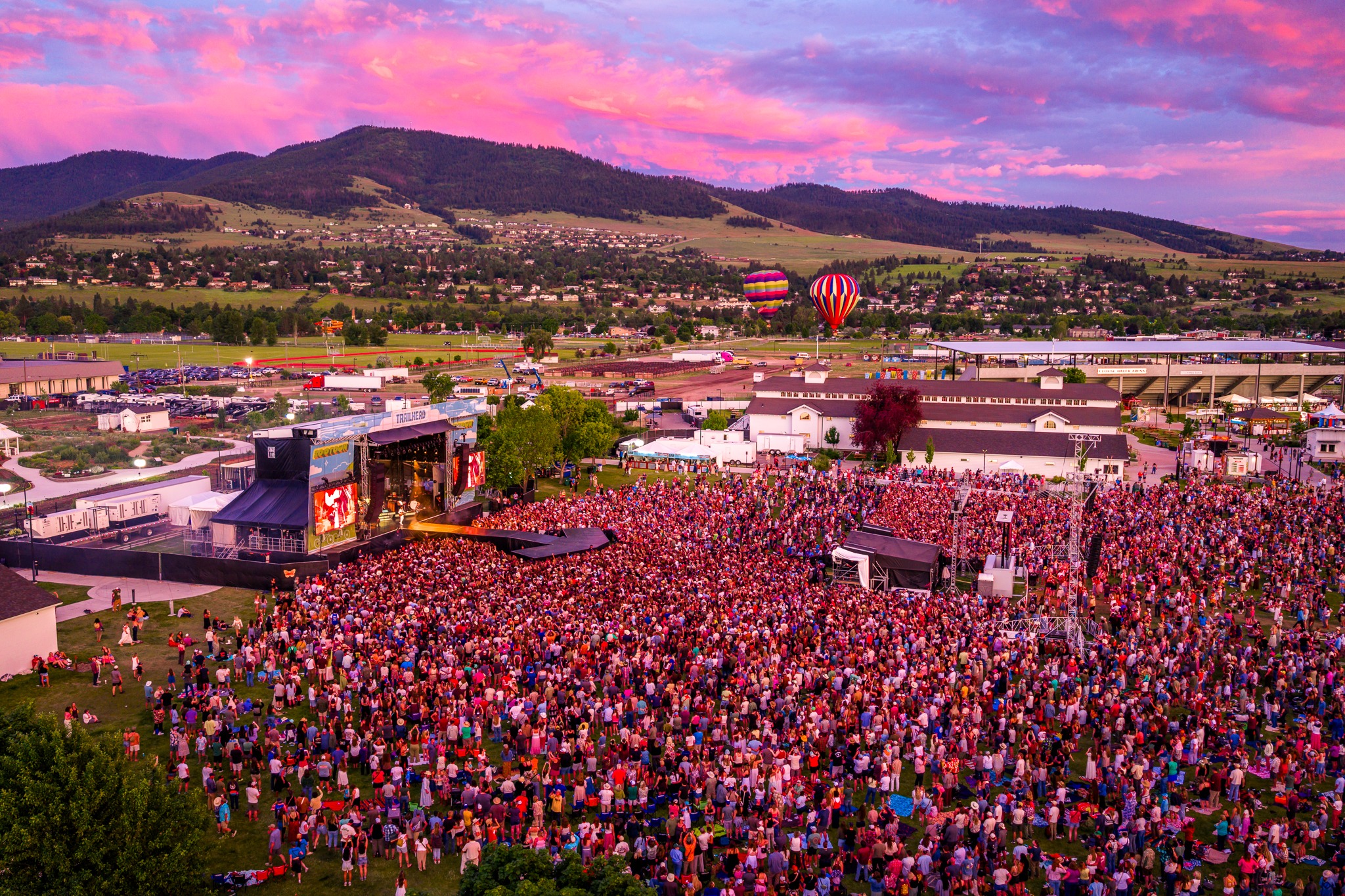 Aerial sunset view of the crowd and stage at Zootown Music Festival 2026 at the Missoula Fairgrounds in Missoula, Montana, photo credit Alive Coverage