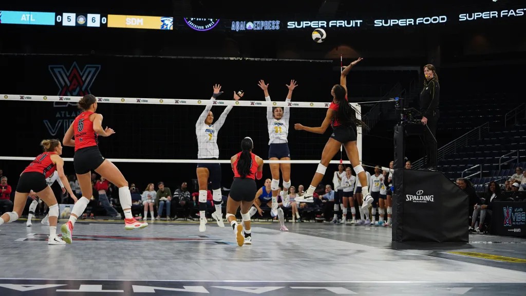 Atlanta Vibe players attack at the net during a Major League Volleyball home match (photo: Atlanta Vibe)