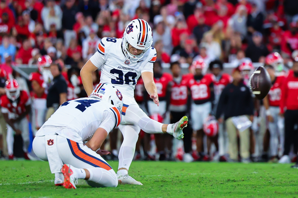Auburn kicker Alex McPherson lines up the game-winning field goal against Georgia.