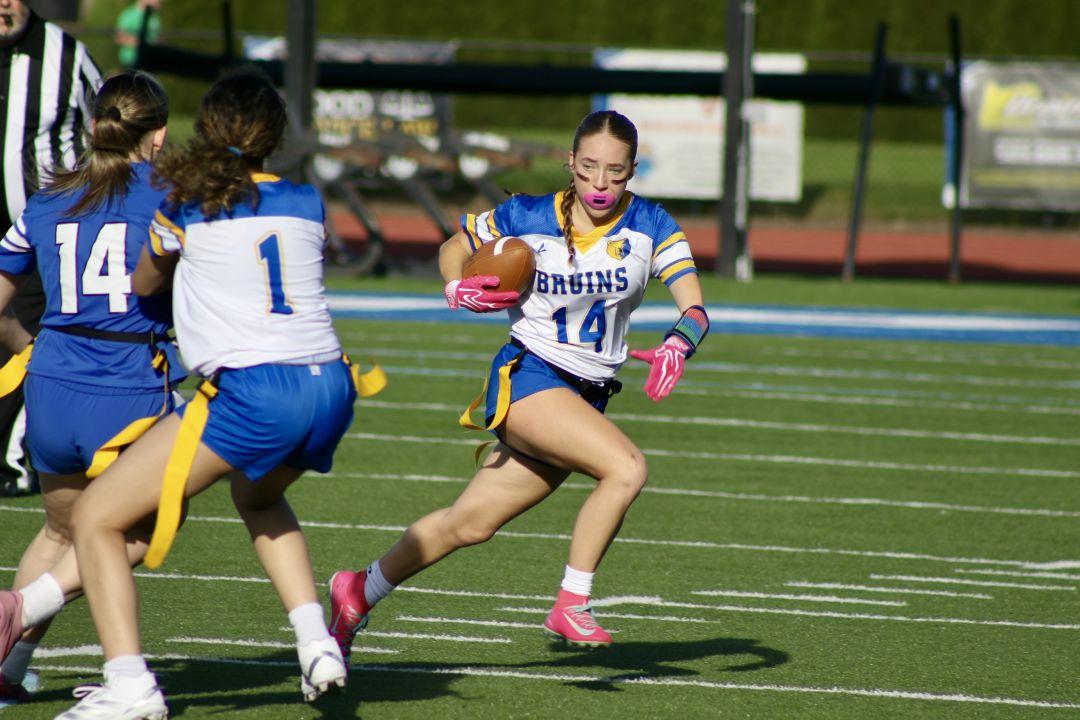 Oregon high school flag football in action — the OSAA voted October 12 to sanction the sport statewide.