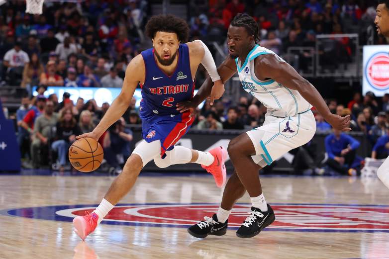 Detroit Pistons guard Cade Cunningham tries to drive around Charlotte Hornets guard Sion James during the second half on Oct. 28, 2026 at Little Caesars Arena in Detroit