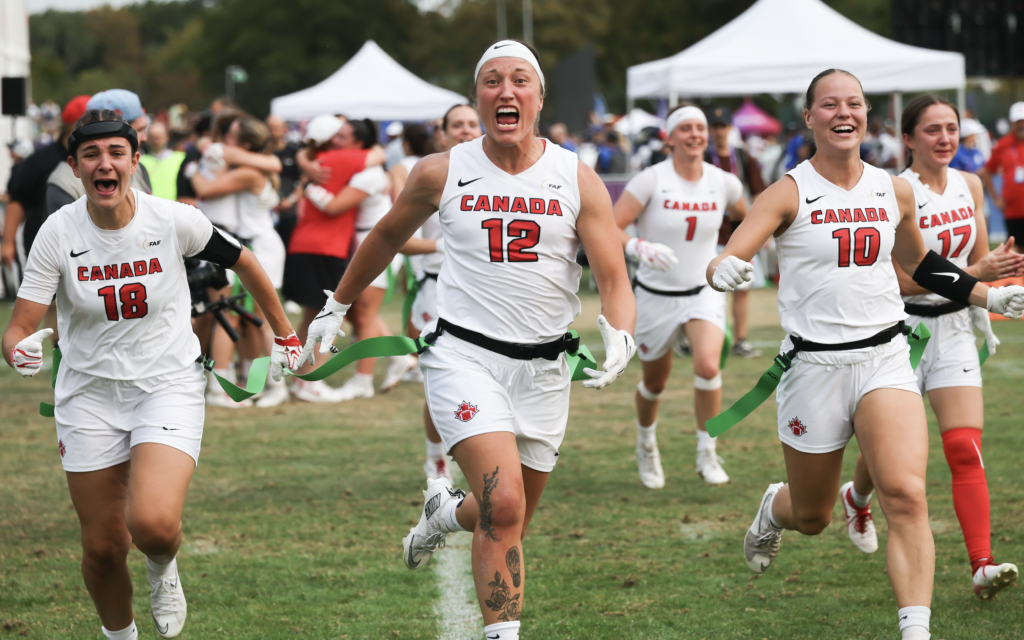 Canada's women's flag football team celebrates its world championship in Düsseldorf, Germany.