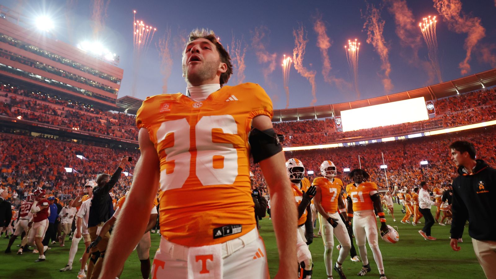 Tennessee celebrates its 26-10 win over Alabama — the signature result on a Saturday when five of the AP top seven lost.