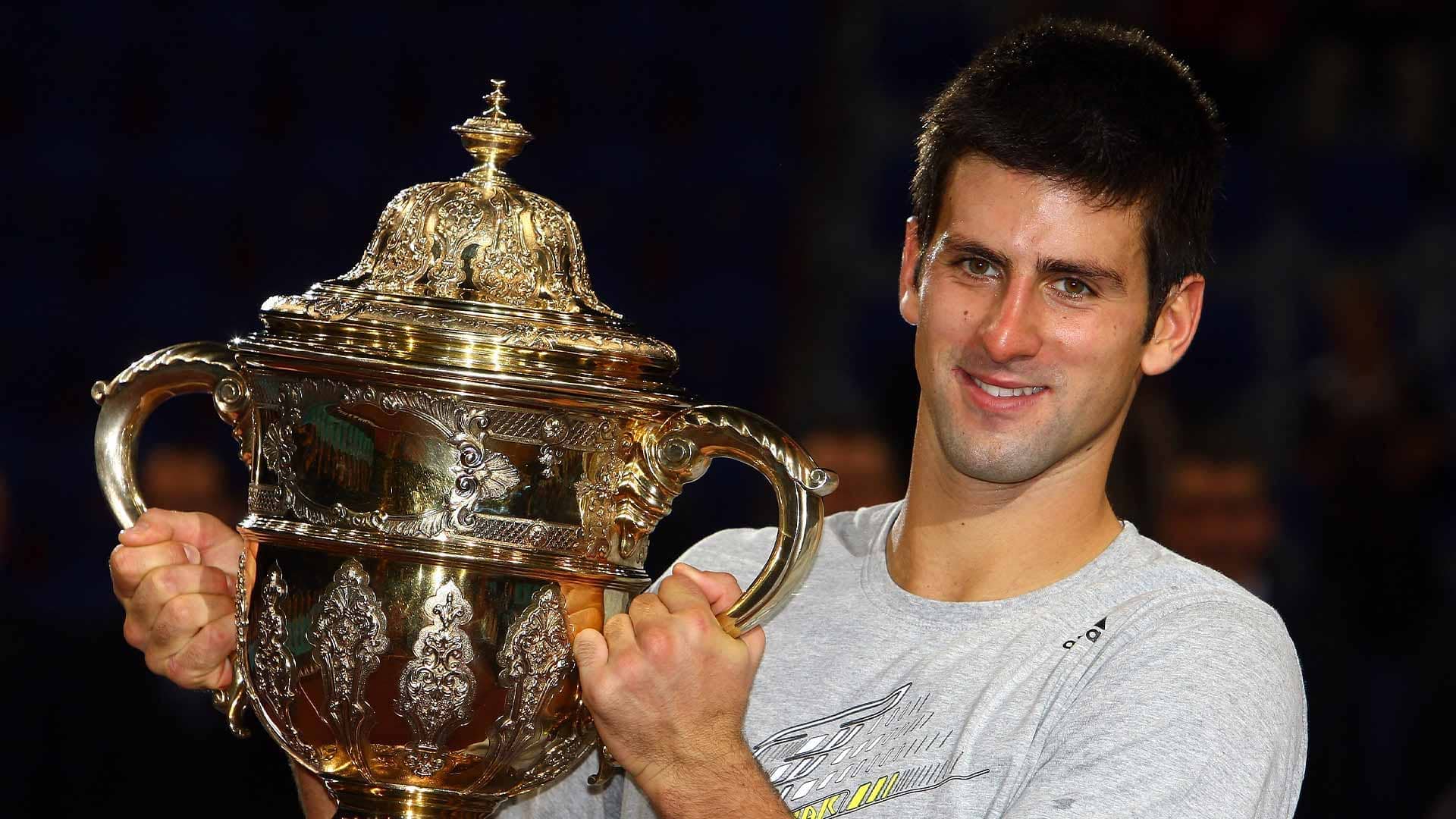 Novak Djokovic holding the Basel trophy in 2009
