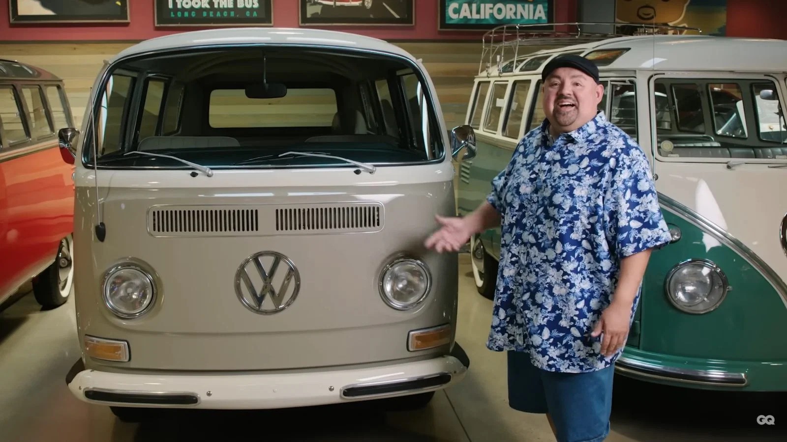 Gabriel “Fluffy” Iglesias standing beside a classic Volkswagen bus from his personal collection
