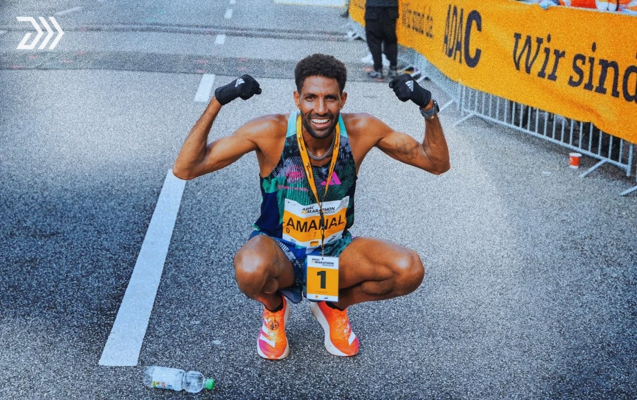 Amanal Petros racing at the front of a marathon