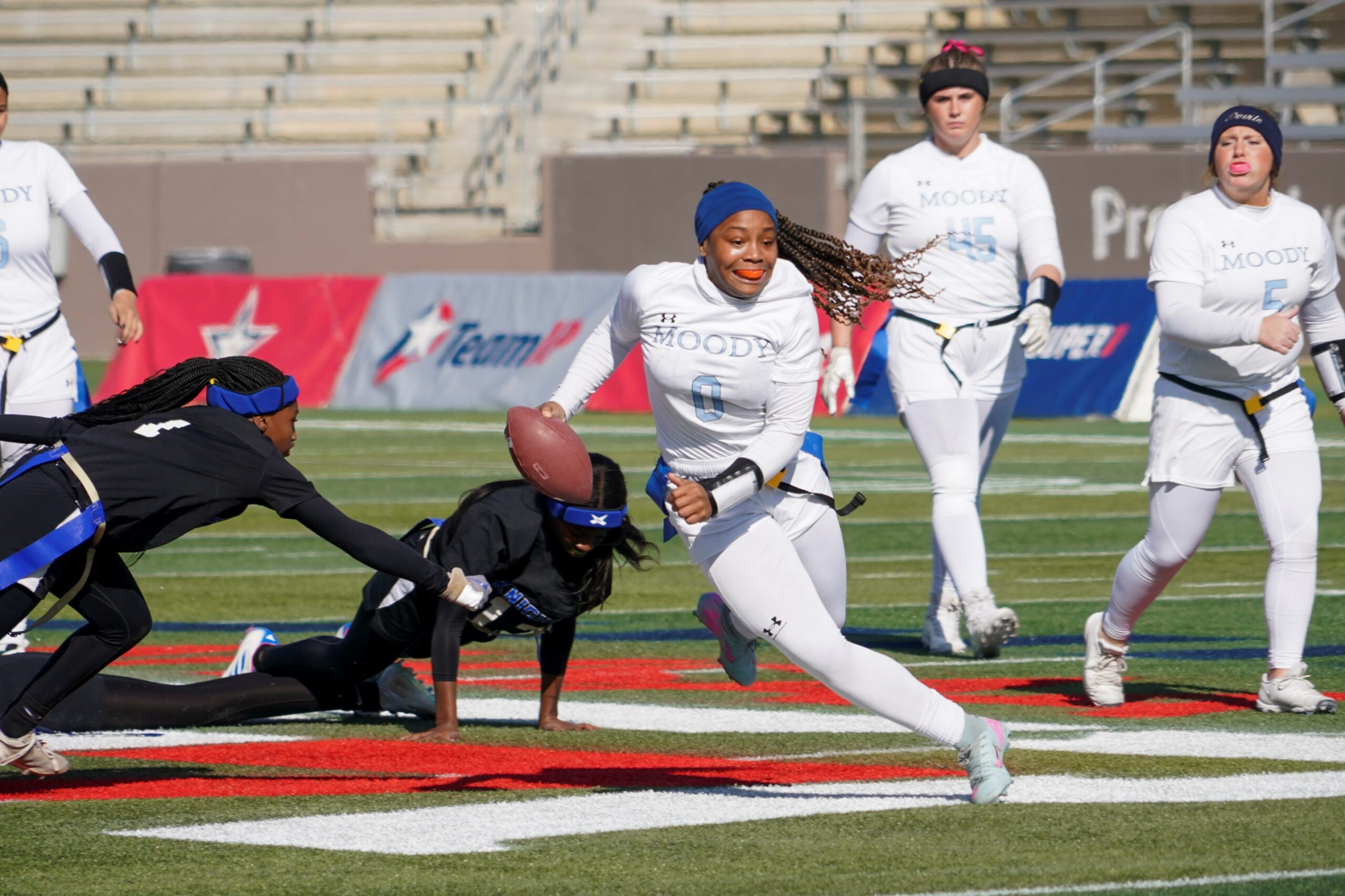 Moody quarterback Serenity Rutledge (0) runs against Montgomery Catholic during the AHSAA state championship game at Protective Stadium.
