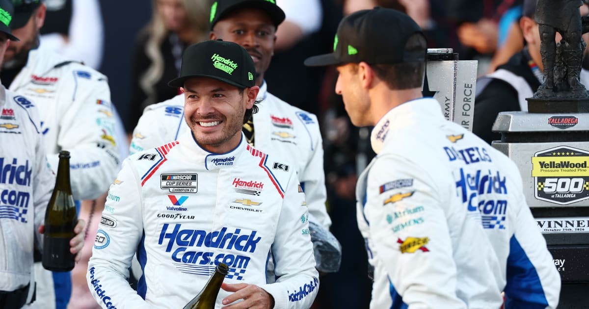 Kyle Larson celebrates with crew chief Cliff Daniels and the No. 5 team after winning the YellaWood 500 at Talladega Superspeedway on October 25, 2026.