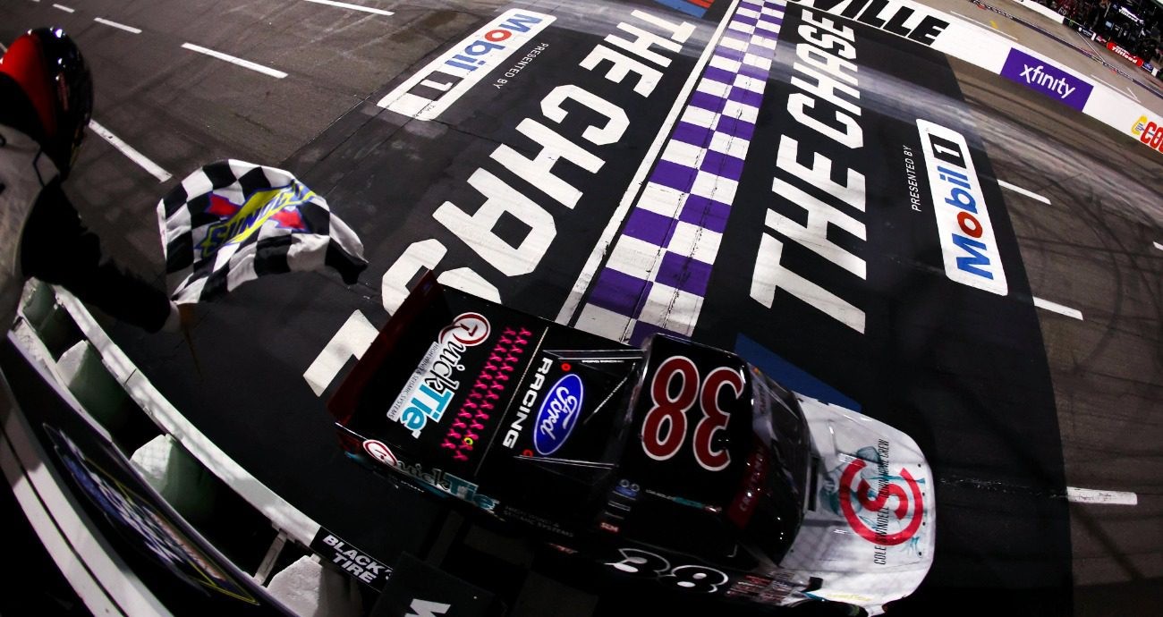 Chandler Smith takes the checkered flag in the No. 38 QuickTie Ford to win the Black's Tire 200 at Martinsville Speedway on October 30, 2026.