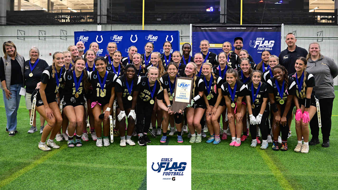The Penn Kingsmen celebrate their second consecutive Indiana girls flag football state championship at Grand Park.