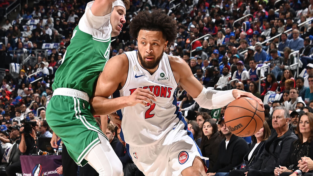 Detroit Pistons guard Cade Cunningham drives against the Boston Celtics on opening night