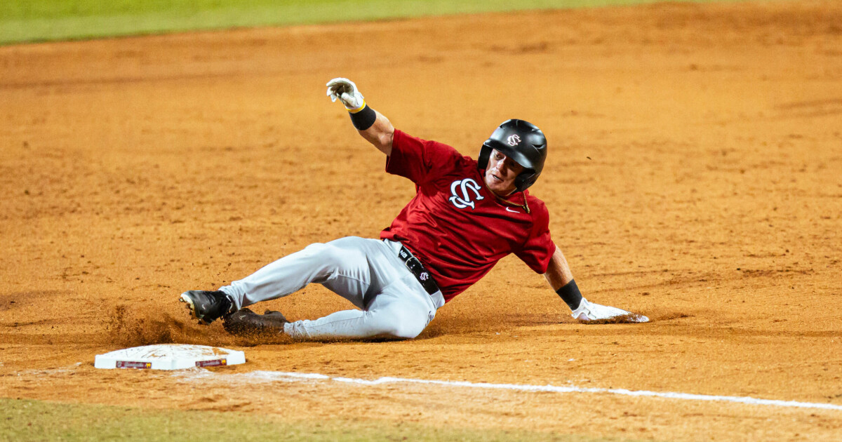 A South Carolina Gamecock slides into third base during the fall exhibition against High Point at Founders Park.