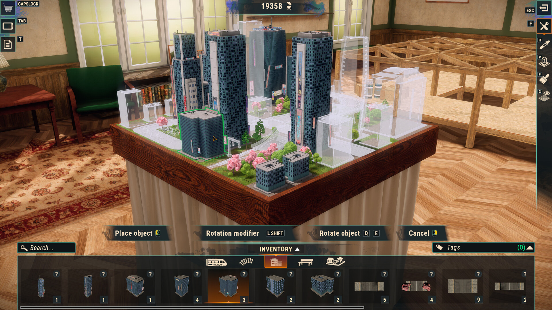 Train Yard Builder gameplay screenshot showing a model railway table with buildings and an inventory bar