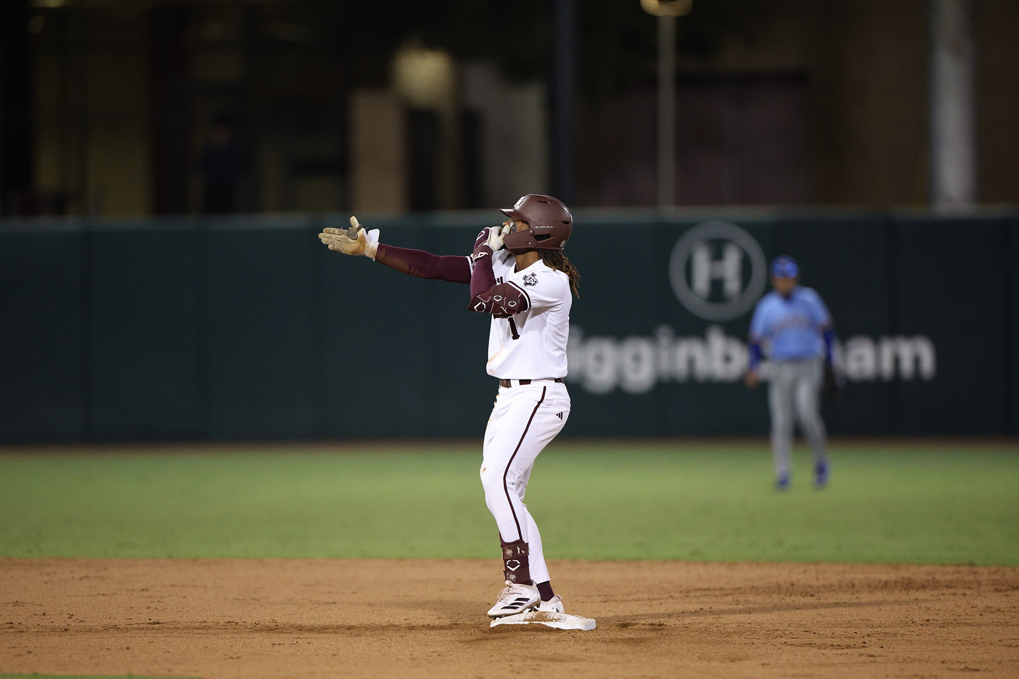 A Texas A&M player celebrates on the bases during the Aggies' fall exhibition against McNeese at Blue Bell Park.