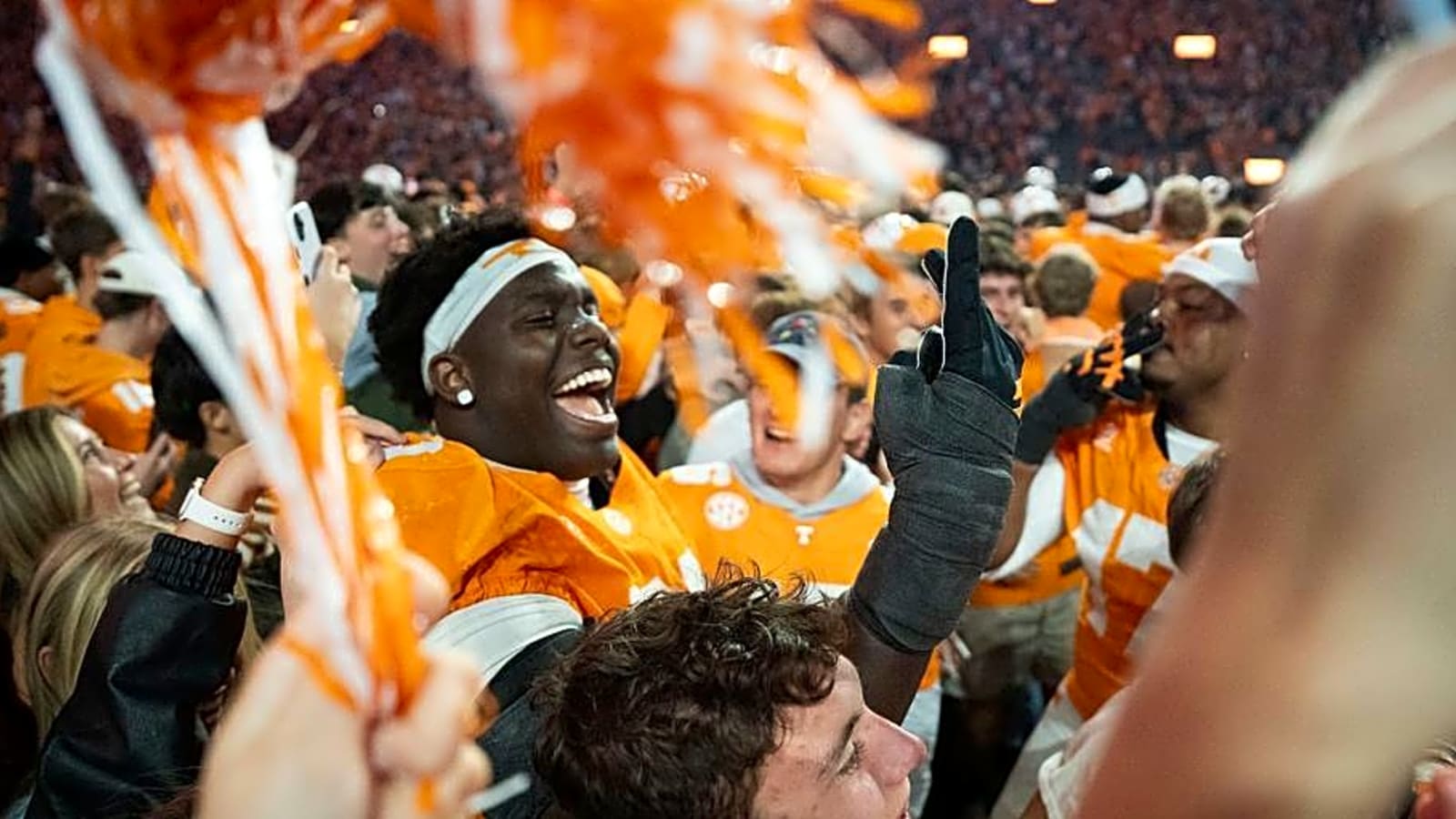 Tennessee fans storm the field after the Volunteers' 26-10 win over Alabama in Knoxville.