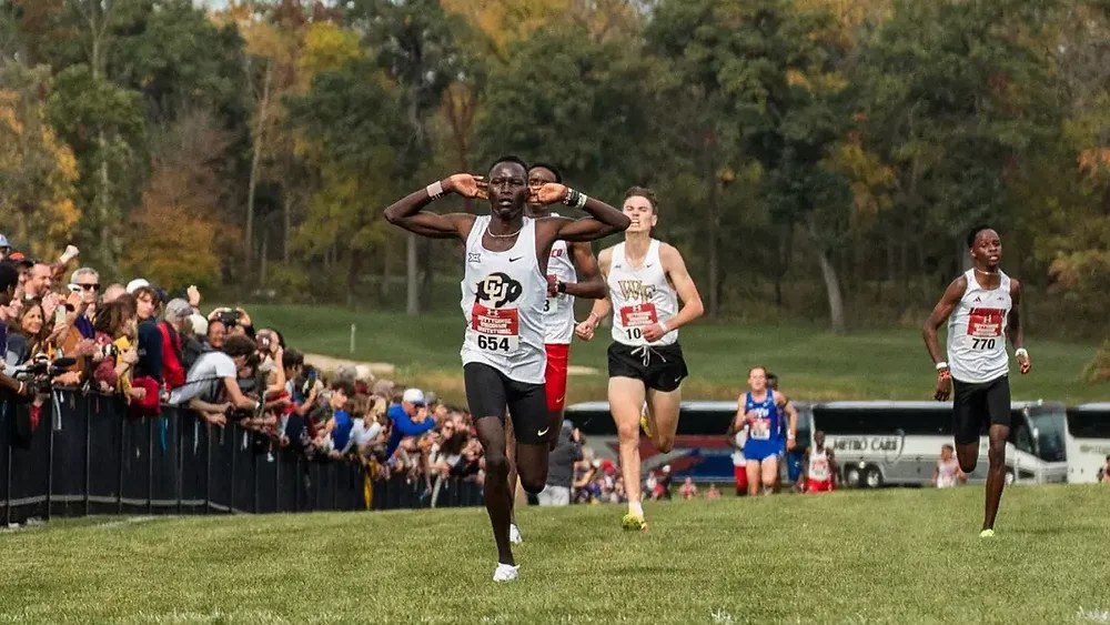 Colorado's Meshack Kipruto edging New Mexico's Pasanjo Kitonga at the Nuttycombe Invitational