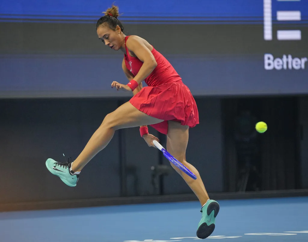 Zheng Qinwen hitting a backhand at the China Open